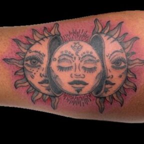 Sun and Moon Faces Upper Arm